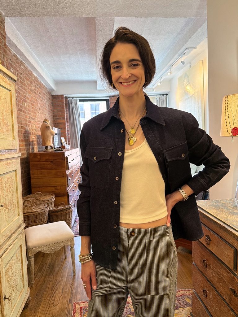 Amy layering the CPO Button Down over a tank in the TriBeCa studio